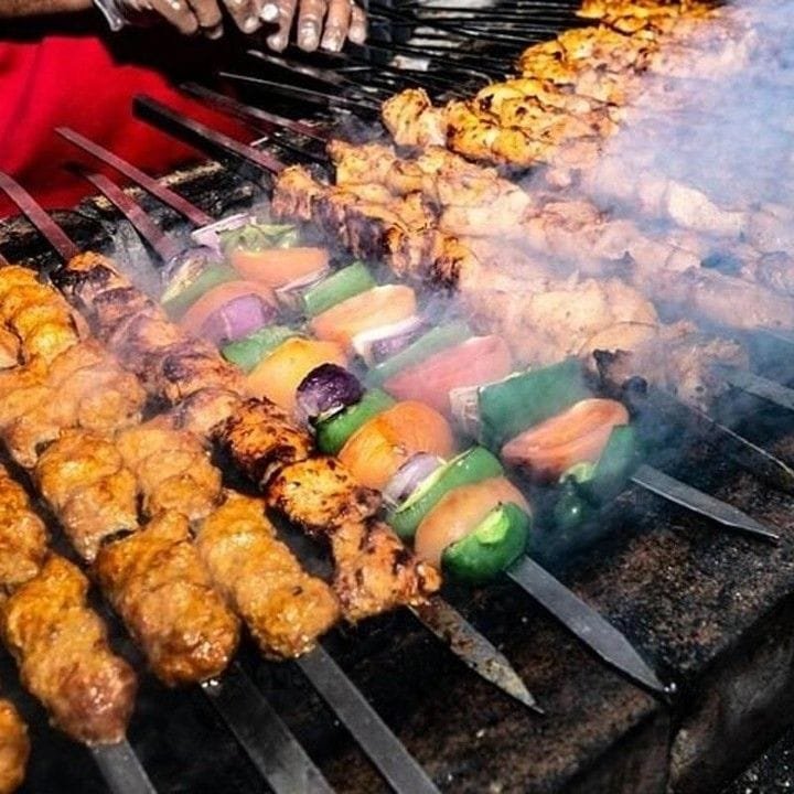 Live BBQ grilling at Abu Dhabi desert camp