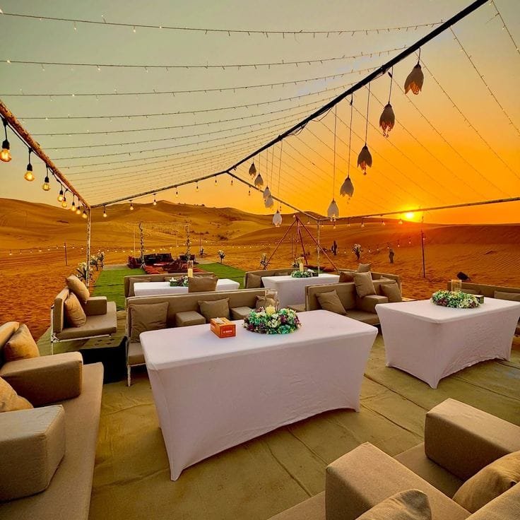 Night sky and Milky Way over a desert camp near Moreeb Dune Liwa