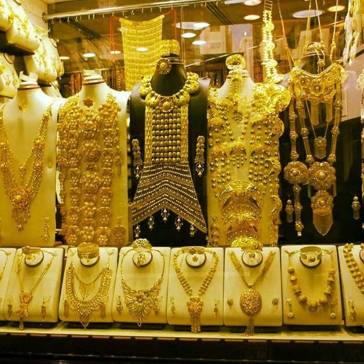 Gold necklaces and jewellery displayed in a Dubai souk shop