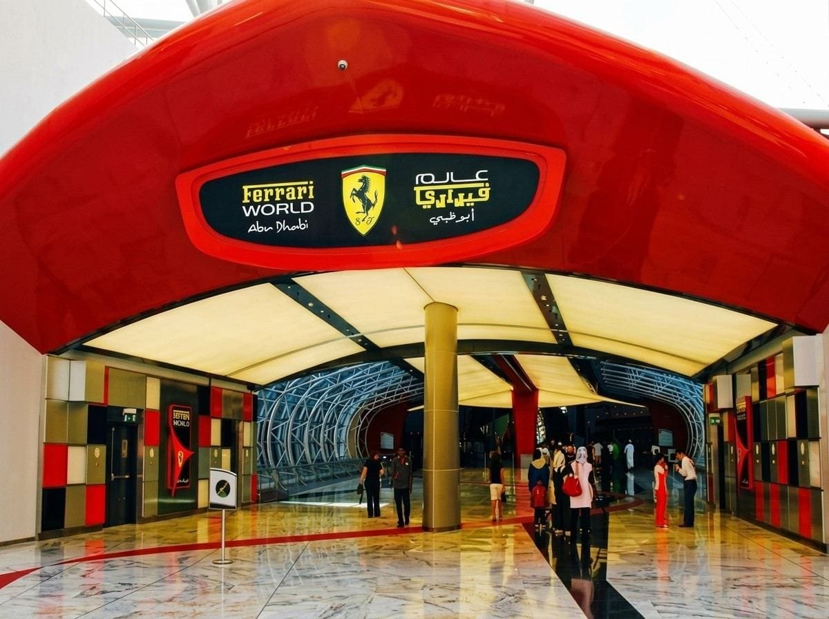 Red Ferrari World entrance canopy on Yas Island, the last stop of the city tour with Ferrari World